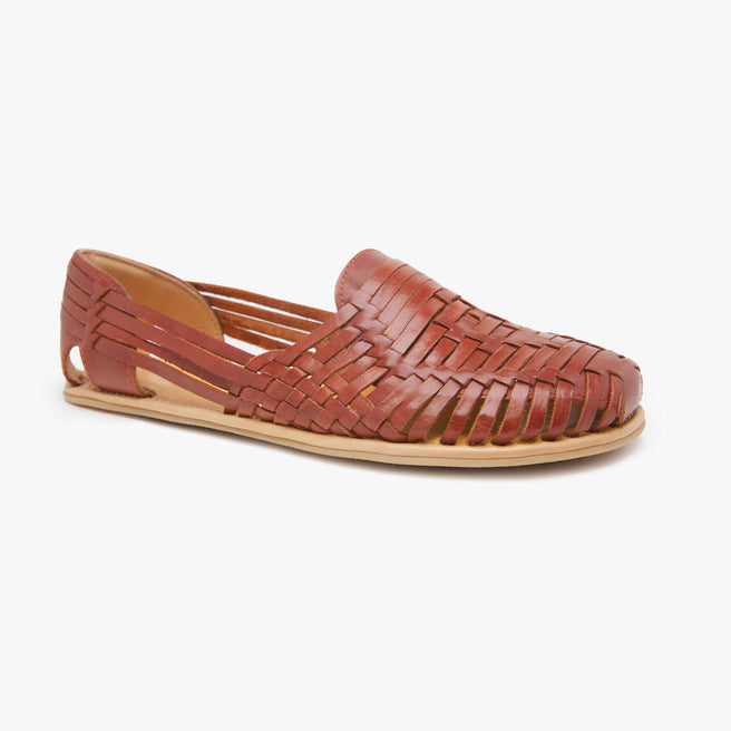 Cinnamon brown woven leather Huarache Slip-On Wide by Anya, angled three-quarter view of a single closed shoe.