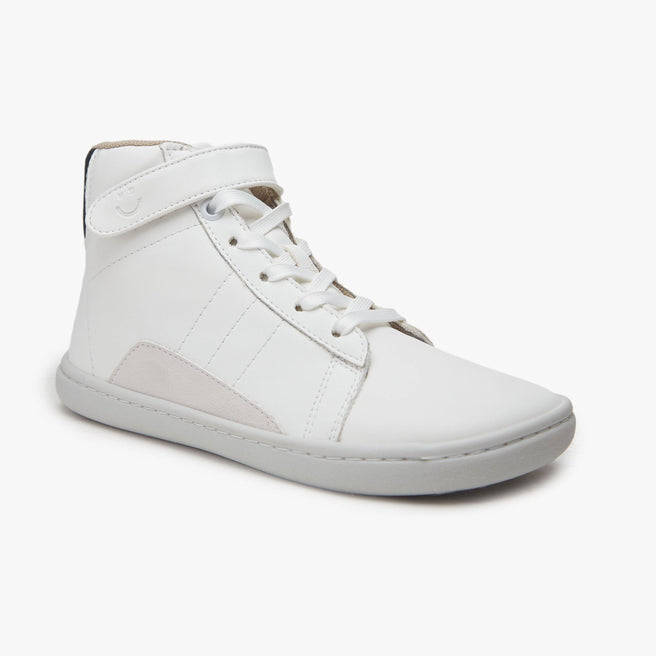 White leather Kid's High-Top Sneaker by Origo with grey suede detail, angled side view with white sole.