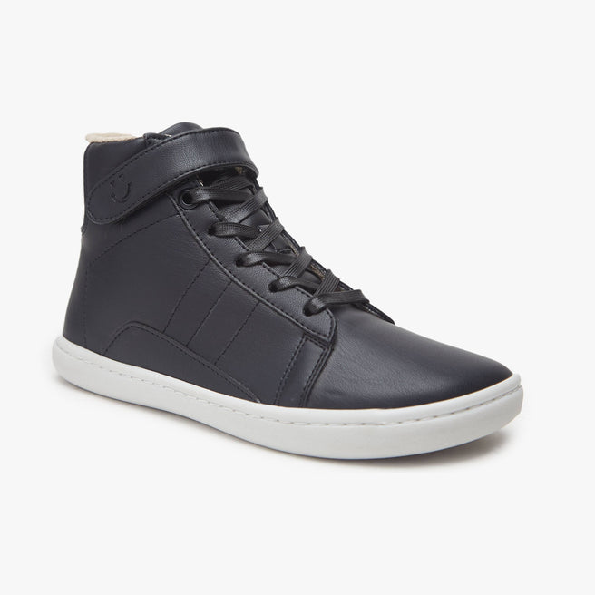 Black leather Kid's High-Top Sneaker by Origo with laces and ankle strap, angled side view with white sole.