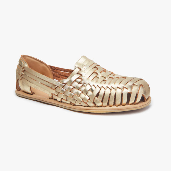Metallic gold woven leather Huarache Slip-On Wide by Anya, angled three-quarter view of a single closed shoe.