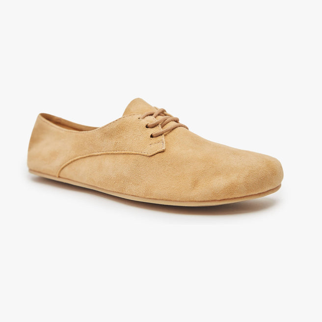 Sand beige suede Women's Derby by Origo, angled three-quarter view of a single lace-up flat with gum sole.