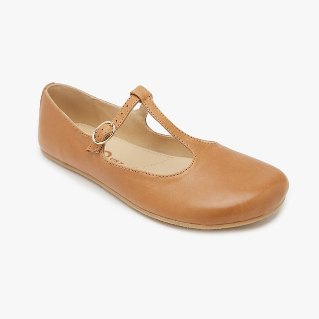 The Women's T Strap Color barefoot flat Honey in a white background 1