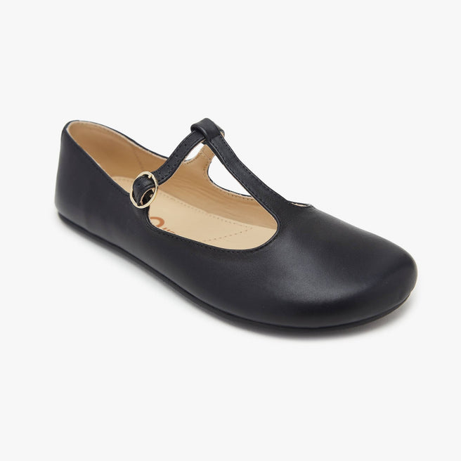 Black leather Women's T-Strap flat by Origo with buckle, angled three-quarter view.