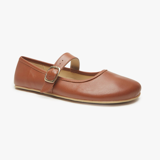 Light brown leather Women's Classic Mary Jane flat by Origo with single strap and buckle, angled three-quarter view.