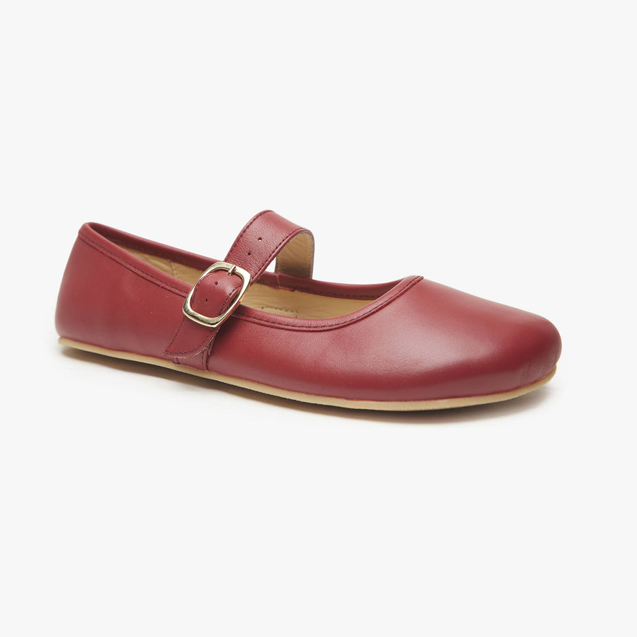Ruby red leather Women's Classic Mary Jane flat by Origo with single strap and buckle, angled three-quarter view.