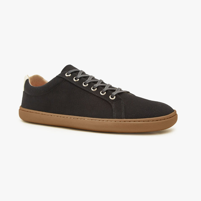 Black cotton canvas Men's Everyday Sneaker Gen 3 by Origo, angled side view with amber gum sole.