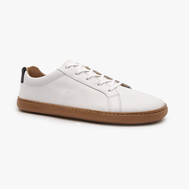 White natural leather Men's Everyday Sneaker Gen 3 by Origo, angled side view with amber gum sole.