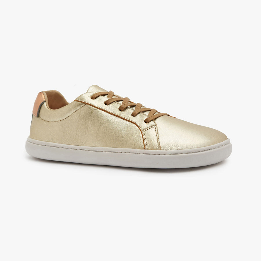 Metallic gold leather Women's Everyday Sneaker Gen 3 by Origo, angled side view with white sole.