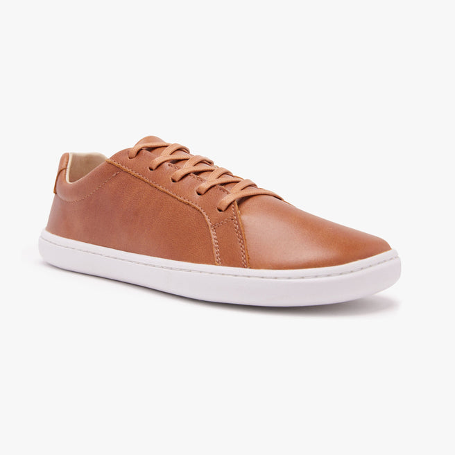 Caramel tan natural leather Women's Everyday Sneaker Gen 3 by Origo, angled side view with white sole.