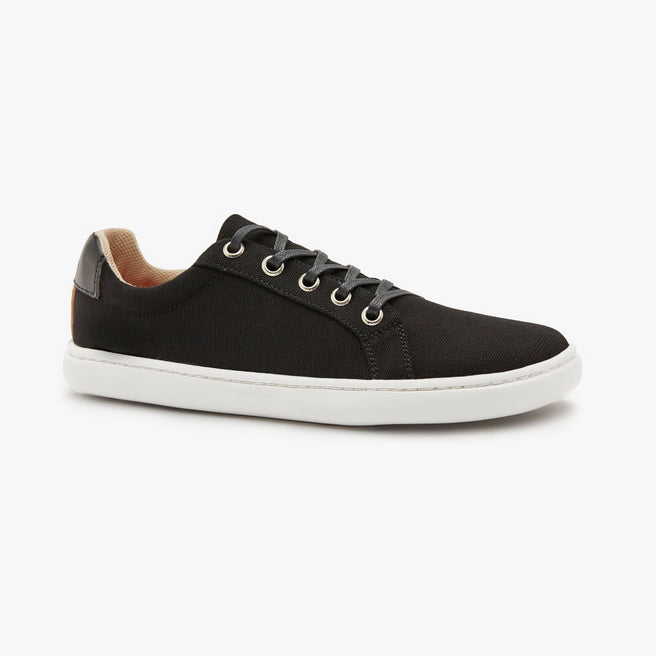 Black cotton canvas Women's Everyday Sneaker Gen 3 by Origo, angled side view with white sole.