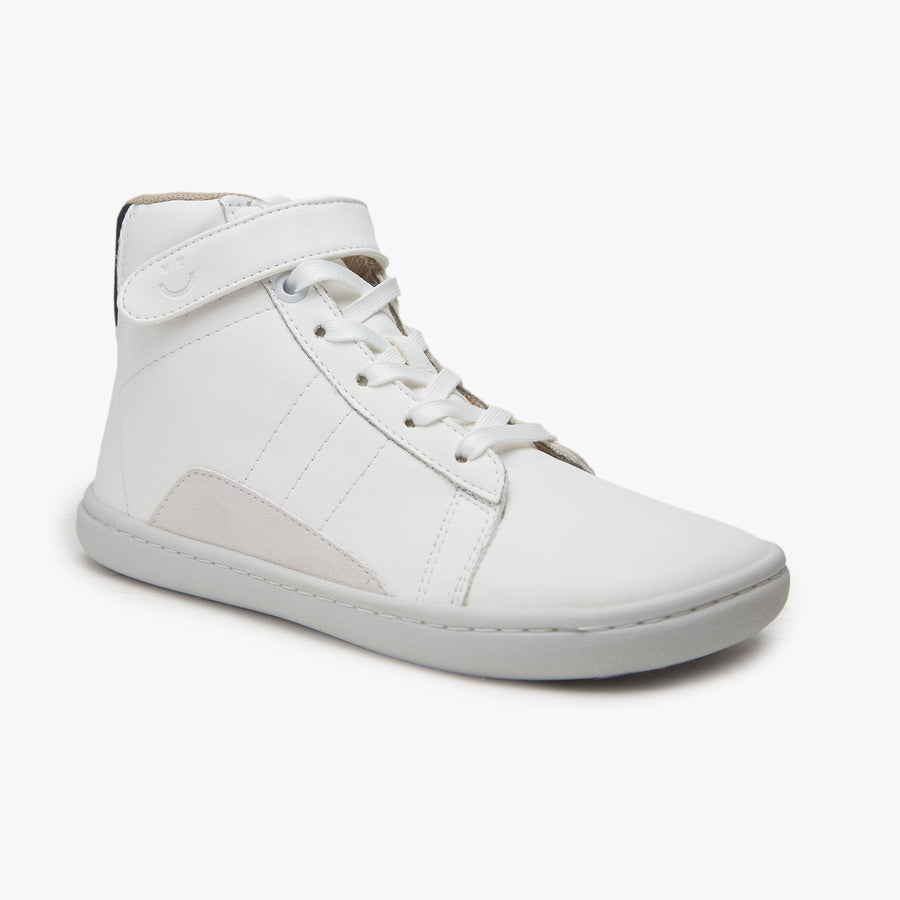 White leather Kid's High-Top Sneaker by Origo with grey suede detail, angled side view with white sole.