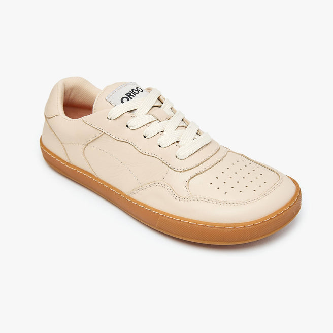 Sand cream Women's Modern Retro Sneaker by Origo, angled three-quarter view of a single shoe with gum sole.