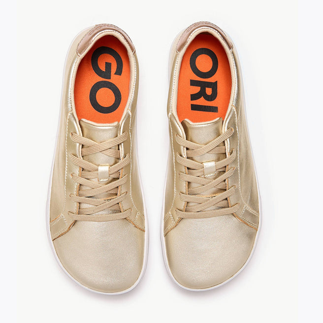 The Women's Everyday Sneaker in metallic gold natural leather - Origo barefoot shoes