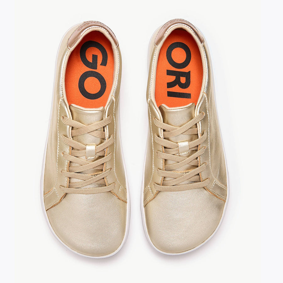The Women's Everyday Sneaker in metallic gold natural leather - Origo barefoot shoes