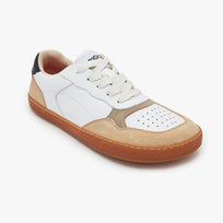 White and tan suede Women's Modern Retro Sneaker by Origo, angled three-quarter view with gum sole.