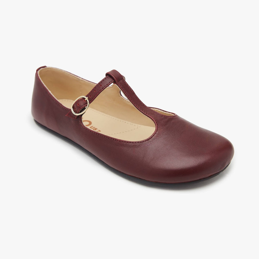 Wine burgundy leather Women's T-Strap flat by Origo with buckle, angled three-quarter view.