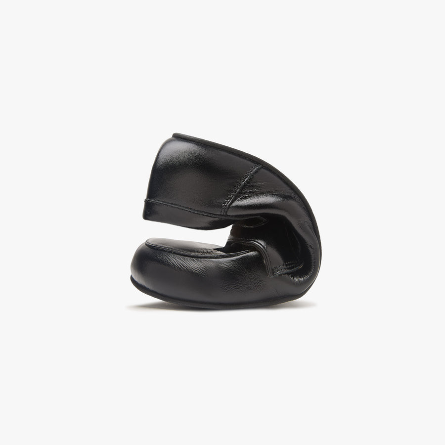 Origo Women's Penny Loafer, Patent Black - flexible sole bending