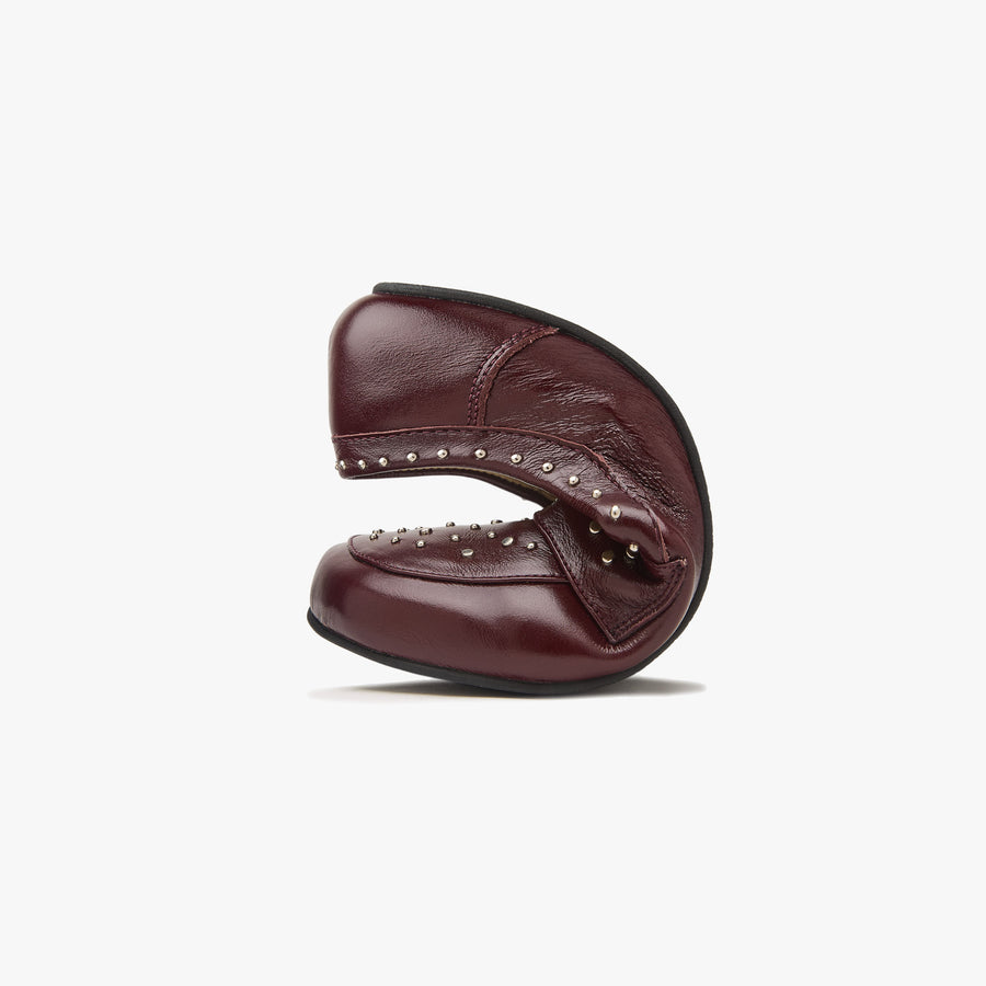 Origo Women's Penny Loafer, Studded Patent Burgundy - flexible sole bending
