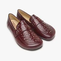 Origo Women's Penny Loafer, Studded Patent Burgundy - three-quarter view of the pair